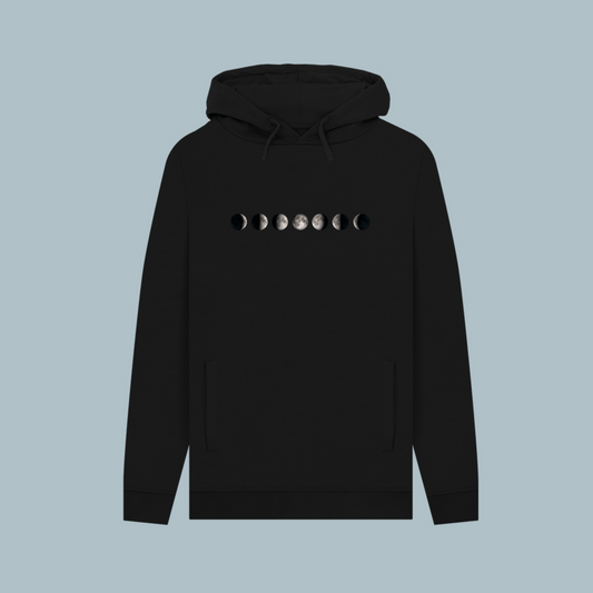 Black hoodie with moon phase design on a light blue background