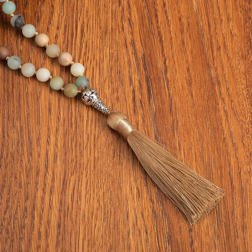 Close-up of Amazonite tassel against wood background