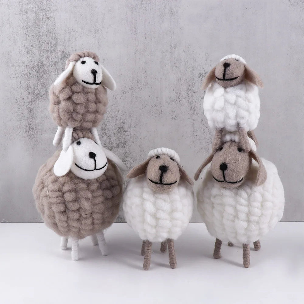 Lifestyle image of five felt sheep in white and grey for Eid arrangement