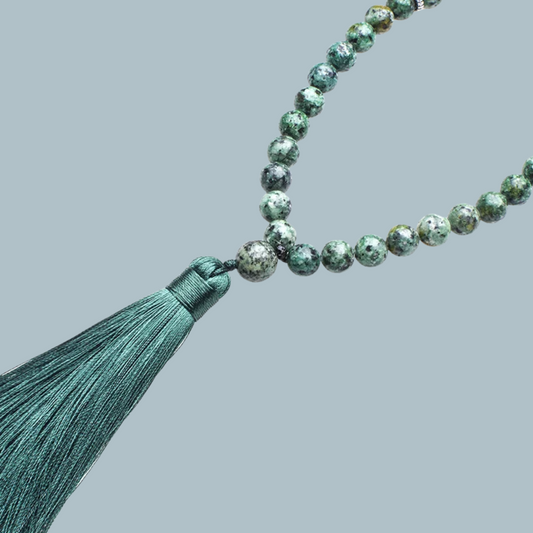 33-bead Green Jasper tasbih with earthy tones on display