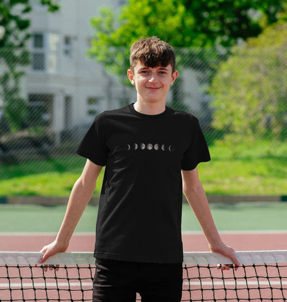 Kids' organic cotton T-shirt in black, featuring a stylish moon phases design, soft, eco-friendly, and perfect for Ramadan and everyday wear.