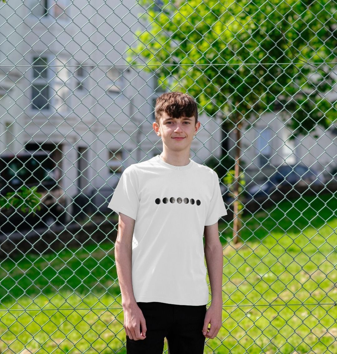 Kids' organic cotton T-shirt in white, featuring a stylish moon phases design, soft, eco-friendly, and perfect for Ramadan and everyday wear.