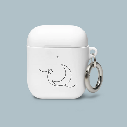 White airpods case with moon and star Lunar Blessings design on a light blue background