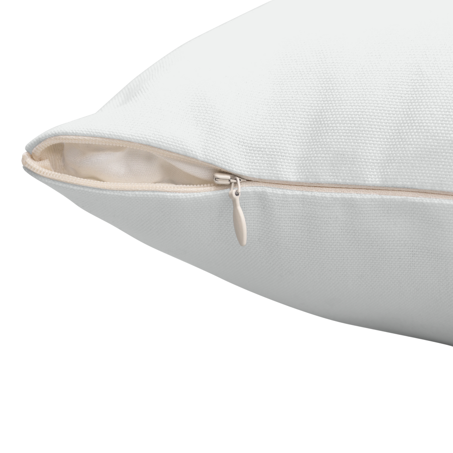 Close-up corner view of pillow showing beige zipper detail