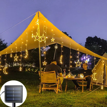 Moon & Star LED Curtain Lights creating a warm and festive outdoor atmosphere, solar-powered for beautiful Ramadan, Eid, and holiday celebrations.