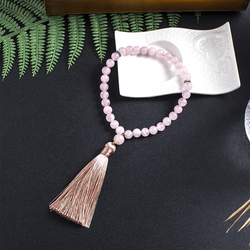 33-bead Rose Quartz tasbih in a serene lifestyle setting