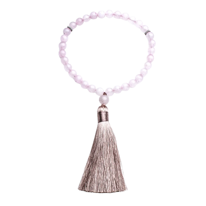 33-bead Rose Quartz tasbih with transparent background showing full strand