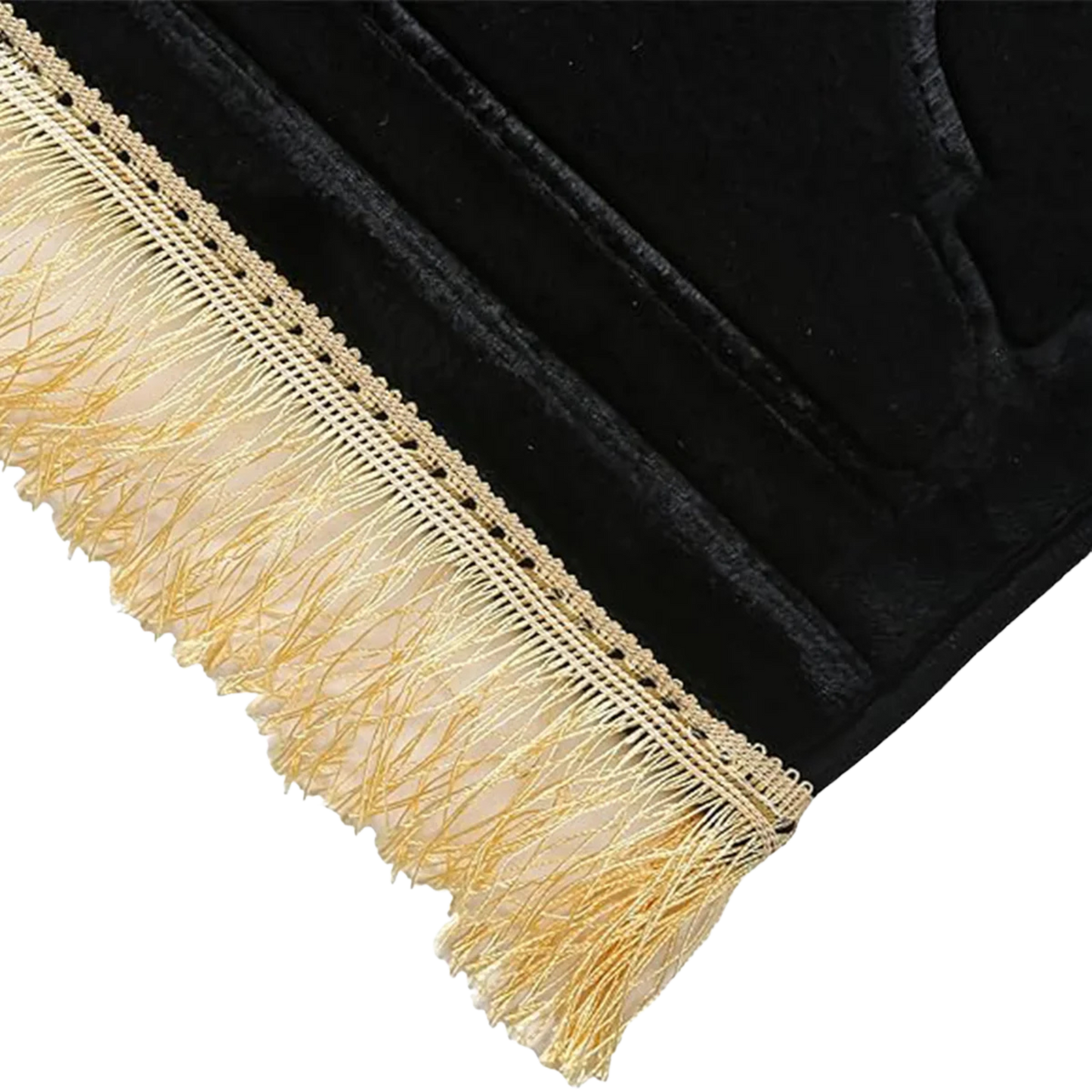 Close-up of rug corner showing decorative tassels