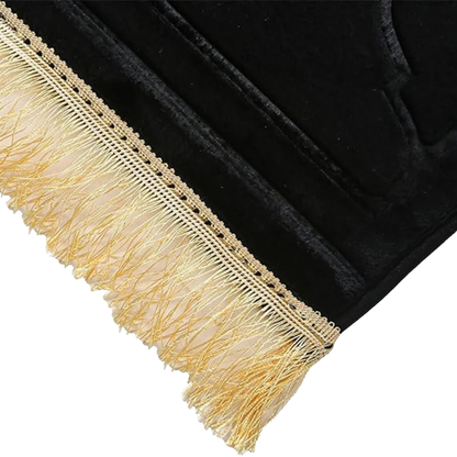 Close-up of rug corner showing decorative tassels