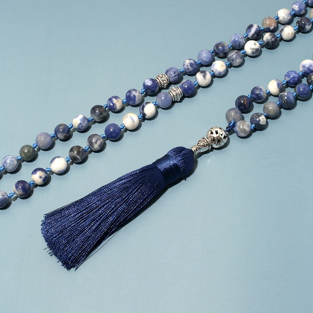 Close-up detail of Sodalite tasbih showing bead texture and silk tassel