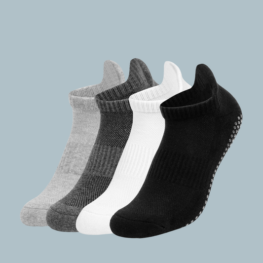 Unisex Tawaf Socks in white, black, dark grey, and light grey colors displayed together